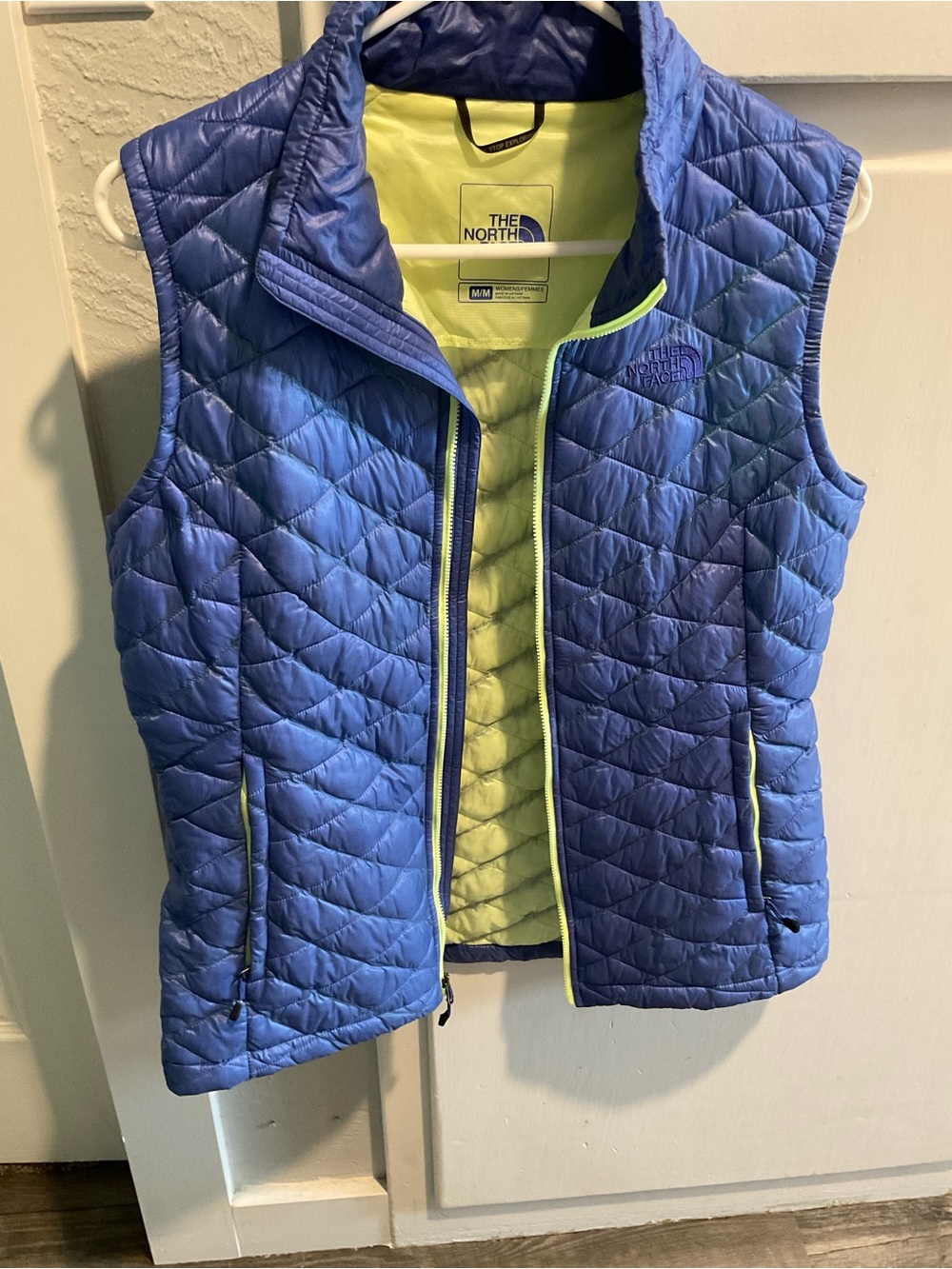 The North Face Blue Quilted Vest with Lime Lining